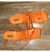 Orange tie up heels