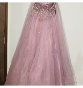 A beautiful engagement gown in pink colour is available